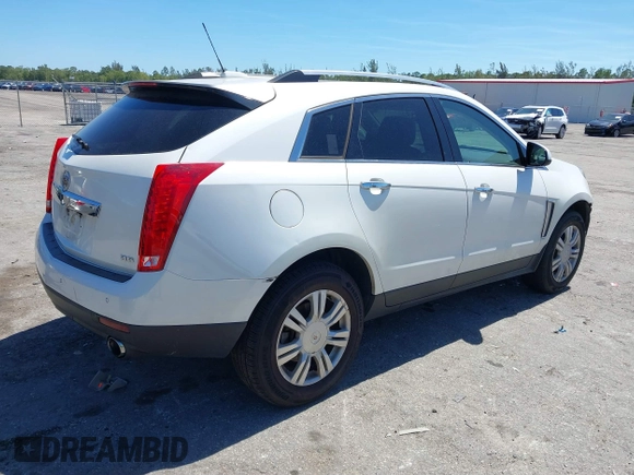 2016 Cadillac SRX Luxury Collection z VIN 3GYFNEE34GS513728, wystawiony jako IAAI lot #41847871 z przebiegiem 109 045 mil mil oraz . Historia ofert i sprzedaży dostępna na DreamBid. Obrazek 4.