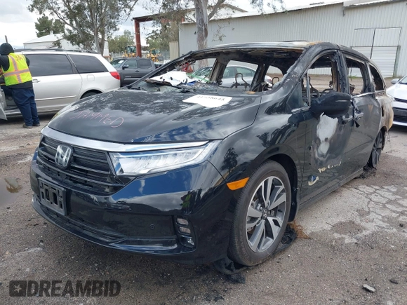 2024 Honda Odyssey Touring with VIN 5FNRL6H86RB001020, listed as a IAAI auction lot 41738645 with Not provided miles and . Bid and sale history available at DreamBid. Image 2.