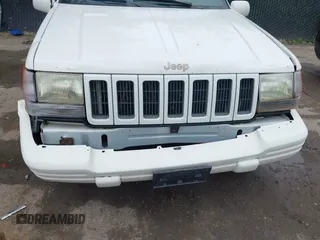 1997 Jeep Grand Cherokee Limited z VIN 1J4GZ78S1VC536295, wystawiony jako IAAI lot #42435292 z przebiegiem 310 005 mil mil oraz . Historia ofert i sprzedaży dostępna na DreamBid. Obrazek 6.