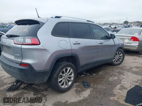 2021 Jeep Cherokee Latitude with VIN 1C4PJLCB0MD115979, listed as a IAAI auction lot 41647031 with 104,415 mi miles. Bid and sale history available at carsss.com. Image 4.