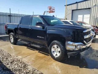 2018 Chevrolet Silverado 1500 LT with VIN 3GCUKREC2JG614144, listed as a Copart auction lot 46355355 with 98,476 mi miles and Salvage Title. Bid and sale history available at carsss.com. Image 4.