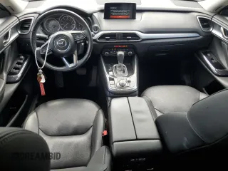2019 Mazda CX-9 Touring with VIN JM3TCACY6K0334121, listed as a Copart auction lot 64901735 with 112,328 mi miles and Salvage title. Bid and sale history available at DreamBid. Image 8.