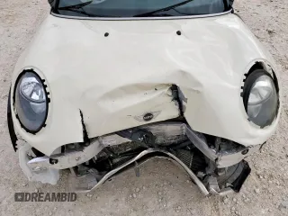 2017 MINI Convertible Cooper z VIN WMWWG5C32H3C20341, wystawiony jako Copart lot #57039685 z przebiegiem 100 575 mil mil oraz Szkoda całkowita • Salvage title. Historia ofert i sprzedaży dostępna na DreamBid. Obrazek 12.