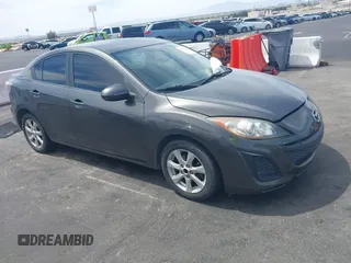 2010 Mazda 3 i Touring with VIN JM1BL1SG6A1251147, listed as a IAAI auction lot 42041631 with Not Provided miles. Bid and sale history available at carsss.com. Image 1.