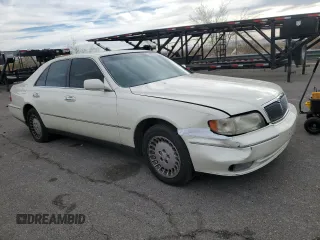 1998 Infiniti Q45 z VIN JNKBY31A8WM403038, wystawiony jako Copart lot #86904484 z przebiegiem 136 142 mil mil oraz Szkoda całkowita • Salvage title. Historia ofert i sprzedaży dostępna na DreamBid. Obrazek 4.