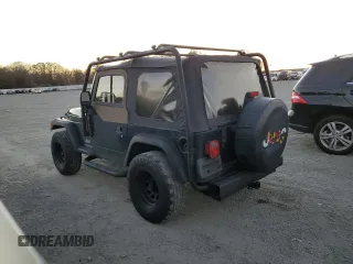 2005 Jeep Wrangler SE with VIN 1J4FA29155P363501, listed as a Copart auction lot 80388314 with 97,564 mi miles and Clean Title. Bid and sale history available at carsss.com. Image 2.