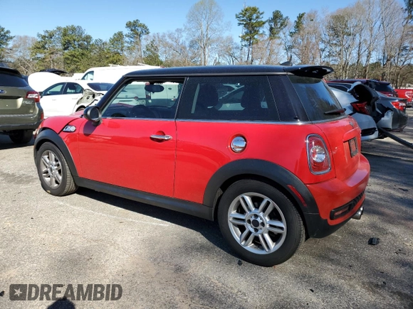 2011 MINI Hardtop S with VIN WMWSV3C5XBTY24525, listed as a Copart auction lot 49977475 with 110,627 mi miles and Salvage title. Bid and sale history available at DreamBid. Image 2.