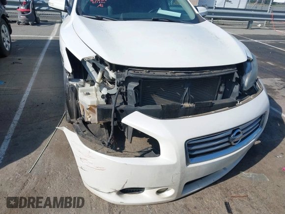 2013 Nissan Maxima SV z VIN 1N4AA5AP0DC821880, wystawiony jako IAAI lot #42222182 z przebiegiem 134 622 mil mil oraz . Historia ofert i sprzedaży dostępna na DreamBid. Obrazek 6.