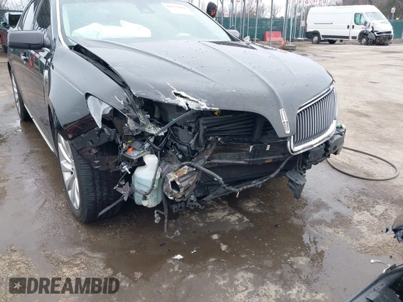2014 Lincoln MKS with VIN 1LNHL9EK7EG609329, listed as a IAAI auction lot 41555819 with 89,849 mi miles. Bid and sale history available at carsss.com. Image 6.