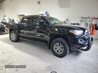 2017 Toyota Tacoma SR5 with VIN 5TFCZ5AN8HX067720, listed as a Copart auction lot 84801184 with 76,148 mi miles and Salvage title. Bid and sale history available at DreamBid. Image 4.