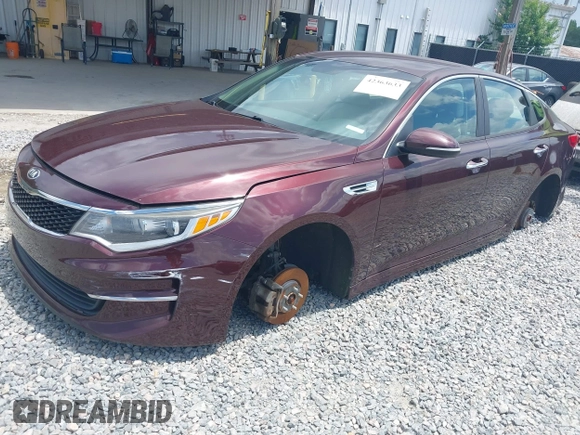 2016 Kia Optima LX with VIN 5XXGT4L3XGG040050, listed as a IAAI auction lot 42363633 with 156,999 mi miles and . Bid and sale history available at DreamBid. Image 2.