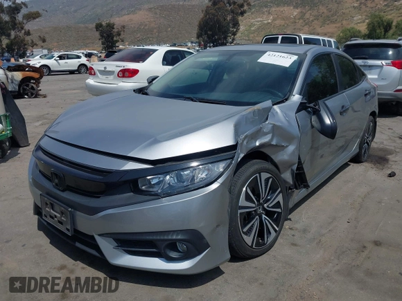 2018 Honda Civic EX-L z VIN JHMFC1F79JX037843, wystawiony jako IAAI lot #42121623 z przebiegiem 49 759 mil mil oraz . Historia ofert i sprzedaży dostępna na DreamBid. Obrazek 21.