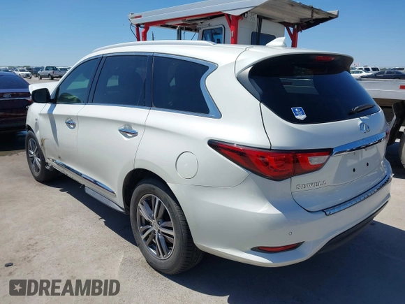 2016 Infiniti QX60 with VIN 5N1AL0MMXGC511972, listed as a IAAI auction lot 41979787 with 127,298 mi miles and . Bid and sale history available at DreamBid. Image 3.