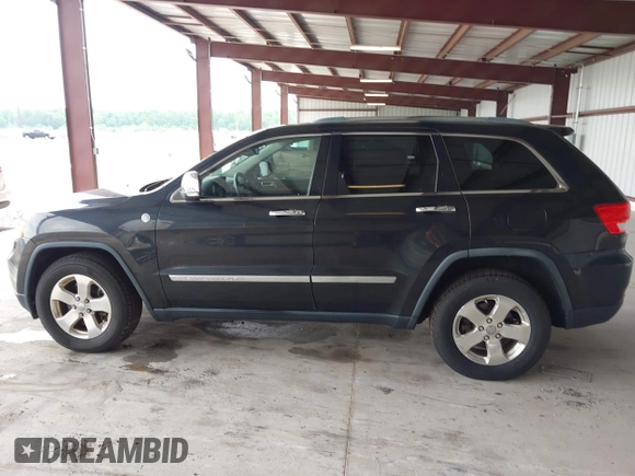 2012 Jeep Grand Cherokee Limited z VIN 1C4RJFBT1CC312006, wystawiony jako IAAI lot #42247170 z przebiegiem 233 890 mil mil oraz . Historia ofert i sprzedaży dostępna na DreamBid. Obrazek 14.