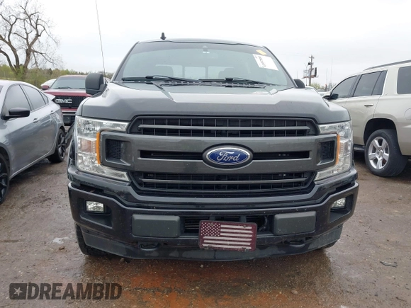 2019 Ford F-150 XL with VIN 1FTEW1EP7KKF18114, listed as a IAAI auction lot 41957860 with 106,017 mi miles and . Bid and sale history available at DreamBid. Image 13.