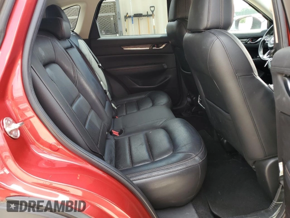 2019 Mazda CX-5 Grand Touring with VIN JM3KFADM2K1657915, listed as a Copart auction lot 56647145 with 85,095 mi miles and Salvage title. Bid and sale history available at DreamBid. Image 11.