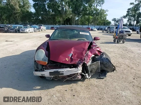 2000 Porsche Boxster z VIN WP0CA2983YU621350, wystawiony jako Copart lot #60596005 z przebiegiem 93 133 mil mil oraz Szkoda całkowita • Salvage title. Historia ofert i sprzedaży dostępna na DreamBid. Obrazek 14.