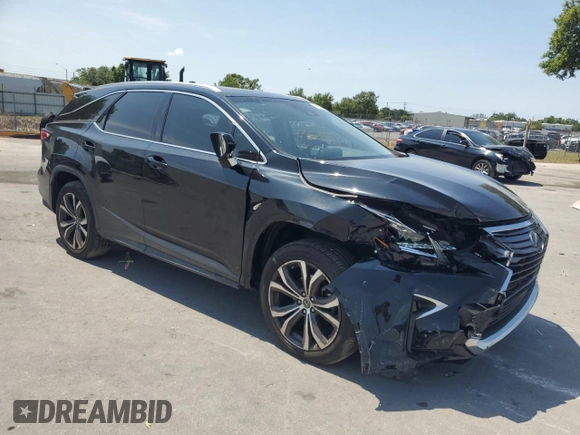 2018 Lexus RX 350L Premium with VIN JTJGZKCA4J2003555, listed as a Copart auction lot 55888515 with 61,391 mi miles and Salvage title. Bid and sale history available at DreamBid. Image 4.