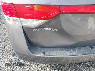 2014 Honda Odyssey Touring with VIN 5FNRL5H99EB111685, listed as a IAAI auction lot 42141227 with 183,484 mi miles and . Bid and sale history available at DreamBid. Image 6.