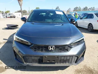 2025 Honda Civic Sport z VIN 19XFL2H83SE005579, wystawiony jako IAAI lot #41878802 z przebiegiem 2 095 mil mil oraz . Historia ofert i sprzedaży dostępna na DreamBid. Obrazek 13.