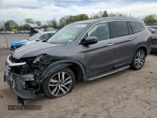 2017 Honda Pilot Touring with VIN 5FNYF5H97HB039702, listed as a Copart auction lot 54046145 with 149,050 mi miles and Salvage Title. Bid and sale history available at carsss.com. Image 1.