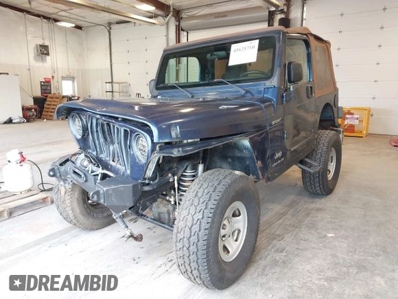 2003 Jeep Wrangler Sport with VIN 1J4FA49S53P311822, listed as a IAAI auction lot 41621710 with 156,023 mi miles. Bid and sale history available at carsss.com. Image 17.
