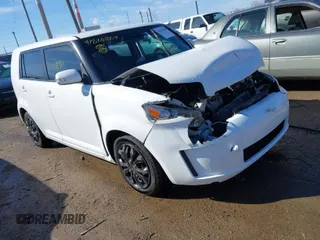 2009 Scion xB with VIN JTLKE50E191063963, listed as a IAAI auction lot 41810804 with 153,869 mi miles. Bid and sale history available at carsss.com. Image 1.