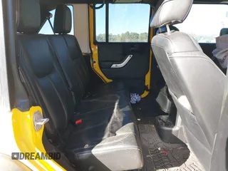 2015 Jeep Wrangler Unlimited Rubicon z VIN 1C4BJWFG4FL681946, wystawiony jako IAAI lot #40809597 z przebiegiem 57 148 mil mil oraz . Historia ofert i sprzedaży dostępna na DreamBid. Obrazek 8.