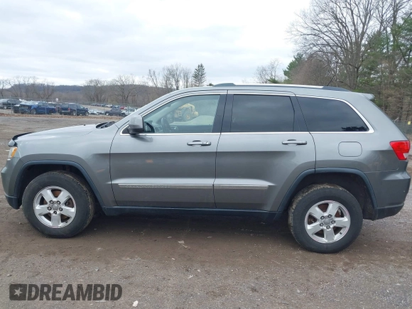 2012 Jeep Grand Cherokee Laredo with VIN 1C4RJFAG0CC270545, listed as a IAAI auction lot 41940781 with 200,529 mi miles. Bid and sale history available at carsss.com. Image 14.
