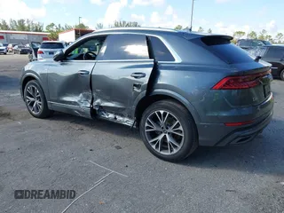 2021 Audi Q8 Premium Plus z VIN WA1EVAF15MD035056, wystawiony jako IAAI lot #41534412 z przebiegiem 65 579 mil mil oraz . Historia ofert i sprzedaży dostępna na DreamBid. Obrazek 6.
