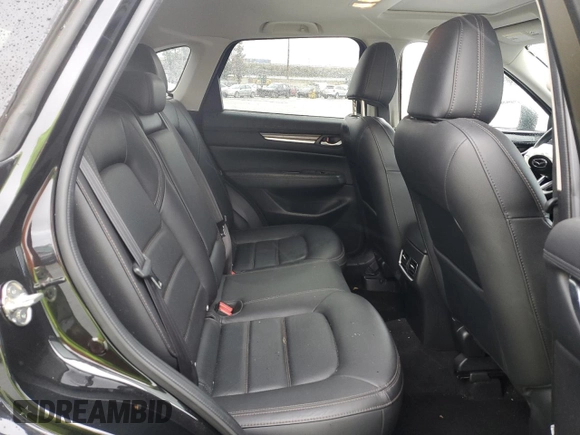 2020 Mazda CX-5 Grand Touring with VIN JM3KFADM3L0815055, listed as a Copart auction lot 48175245 with 56,602 mi miles and Salvage Title. Bid and sale history available at carsss.com. Image 12.