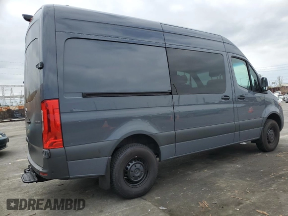 2023 Mercedes-Benz Sprinter Cargo with VIN W1W4NBHY9PT148086, listed as a Copart auction lot 52333884 with 6,056 mi miles and . Bid and sale history available at carsss.com. Image 4.