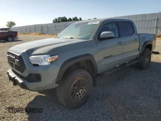 2023 Toyota Tacoma SR with VIN 3TMCZ5ANXPM538450, listed as a Copart auction lot 60802395 with 22,912 mi miles and Salvage title. Bid and sale history available at DreamBid. Image 1.