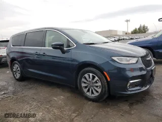 2023 Chrysler Pacifica Hybrid Touring L with VIN 2C4RC1L72PR632382, listed as a Copart auction lot 50989035 with 44,061 mi miles and Salvage Title. Bid and sale history available at carsss.com. Image 4.