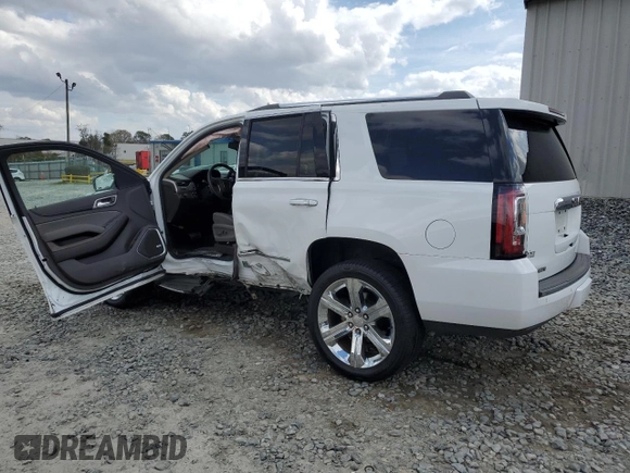 2019 GMC Yukon Denali with VIN 1GKS1CKJ6KR268230, listed as a Copart auction lot 47489035 with 49,549 mi miles and Salvage Title. Bid and sale history available at carsss.com. Image 2.