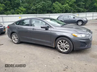 2020 Ford Fusion SE z VIN 3FA6P0HD2LR143538, wystawiony jako Copart lot #56977285 z przebiegiem 96 201 mil mil oraz Czysty tytuł • Clean title. Historia ofert i sprzedaży dostępna na DreamBid. Obrazek 4.