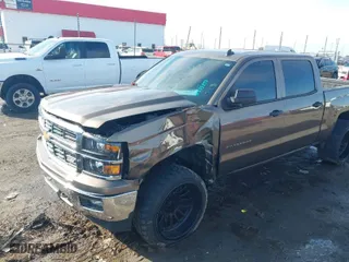 2014 Chevrolet Silverado 1500 LT with VIN 3GCUKRECXEG281990, listed as a IAAI auction lot 41535853 with 142,702 mi miles. Bid and sale history available at carsss.com. Image 6.