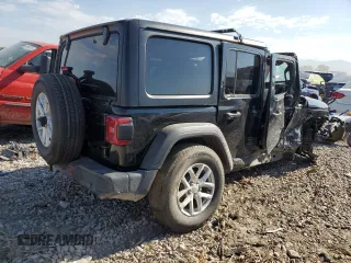 2023 Jeep Wrangler Sport Altitude with VIN 1C4HJXDN9PW634199, listed as a Copart auction lot 65940434 with Not Provided miles and Salvage Title. Bid and sale history available at DreamBid. Image 3.