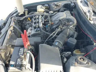 1996 Toyota Camry LE z VIN 4T1BF12K0TU864969, wystawiony jako IAAI lot #43022058 z przebiegiem 166 721 mil mil oraz . Historia ofert i sprzedaży dostępna na DreamBid. Obrazek 19.