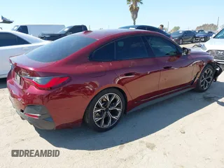 2023 BMW i4 eDrive40 z VIN WBY73AW05PFN76126, wystawiony jako IAAI lot #41856709 z przebiegiem 24 752 mil mil oraz . Historia ofert i sprzedaży dostępna na DreamBid. Obrazek 4.