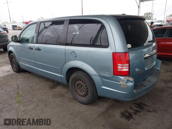 2008 Chrysler Town & Country LX with VIN 2A8HR44H38R831695, listed as a IAAI auction lot 42096656 with 254,424 mi miles and . Bid and sale history available at carsss.com. Image 3.