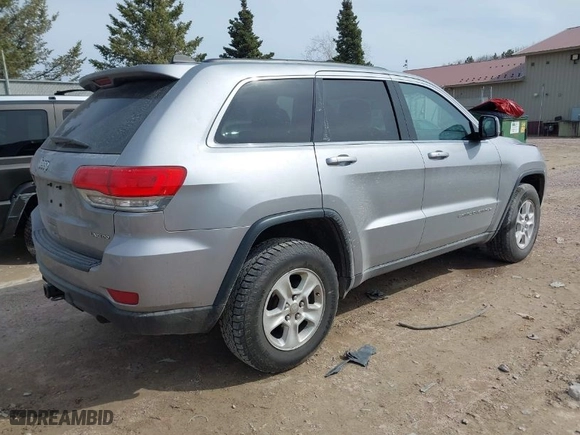 2014 Jeep Grand Cherokee Laredo with VIN 1C4RJFAG7EC243121, listed as a IAAI auction lot 41925695 with 147,999 mi miles. Bid and sale history available at carsss.com. Image 4.