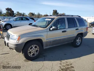 1999 Jeep Grand Cherokee Laredo with VIN 1J4GW58NXXC704719, listed as a Copart auction lot 49546395 with 276,716 mi miles and Clean Title. Bid and sale history available at carsss.com. Image 1.