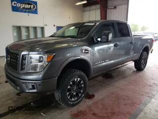 2016 Nissan Titan XD PRO-4X with VIN 1N6BA1F46GN501801, listed as a Copart auction lot 63231474 with 127,728 mi miles and Clean Title. Bid and sale history available at carsss.com. Image 1.