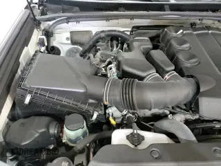 2021 Toyota 4Runner TRD Off Road Premium с VIN JTERU5JRXM5928330, выставлен на аукционе Copart как лот 70804775 с пробегом 125 780 миль миль и Списание • Salvage title. История ставок и продаж доступна на DreamBid. Изображение 16.