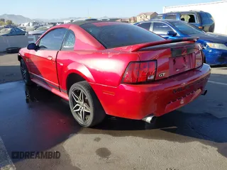 2000 Ford Mustang GT with VIN 1FAFP42X0YF255141, listed as a IAAI auction lot 41558369 with 170,503 mi miles. Bid and sale history available at carsss.com. Image 3.