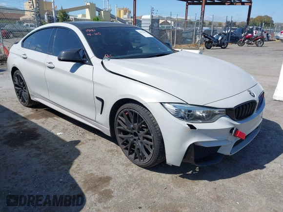 2015 BMW 4 Series 428i xDrive with VIN WBA4C9C54FD330582, listed as a IAAI auction lot 42135691 with 127,289 mi miles and . Bid and sale history available at DreamBid. Image 1.