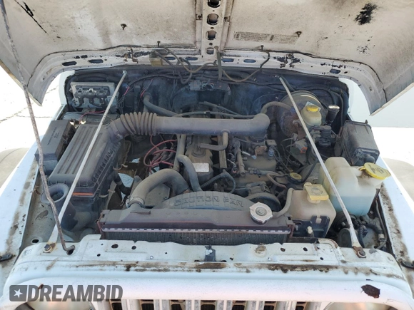1999 Jeep Wrangler Sport with VIN 1J4FY19SXXP464096, listed as a Copart auction lot 61233105 with 167,350 mi miles and Clean title. Bid and sale history available at DreamBid. Image 12.