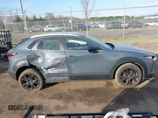 2023 Mazda CX-30 S Carbon Edition with VIN 3MVDMBCM1PM573317, listed as a IAAI auction lot 41785371 with 6,475 mi miles and . Bid and sale history available at DreamBid. Image 13.