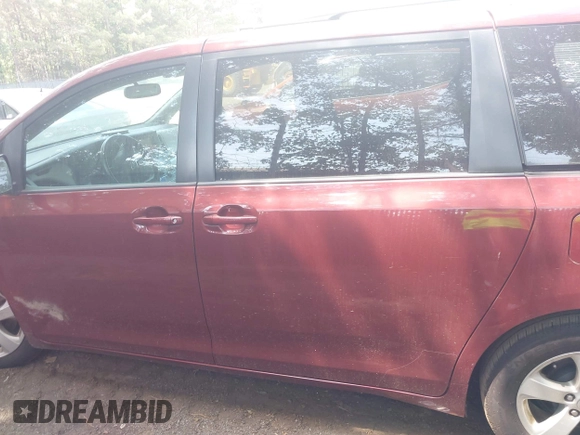 2015 Toyota Sienna LE AAS with VIN 5TDKK3DC5FS576035, listed as a IAAI auction lot 42579218 with 199,664 mi miles and . Bid and sale history available at DreamBid. Image 14.